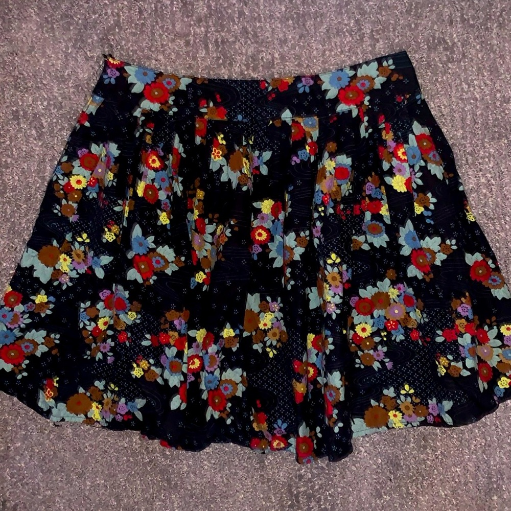 Wet Seal. Navy w floral/red accents. High-waisted. Small-medium.